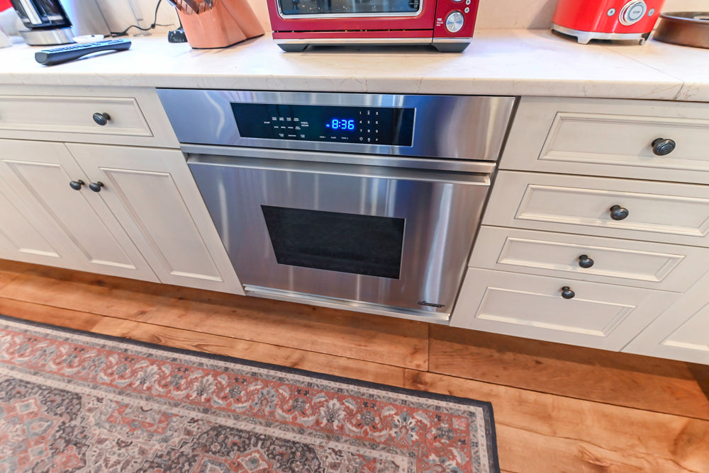 Wood-Mode Traditional Light Cream Kitchen with Marble Countertops and Wolf Range