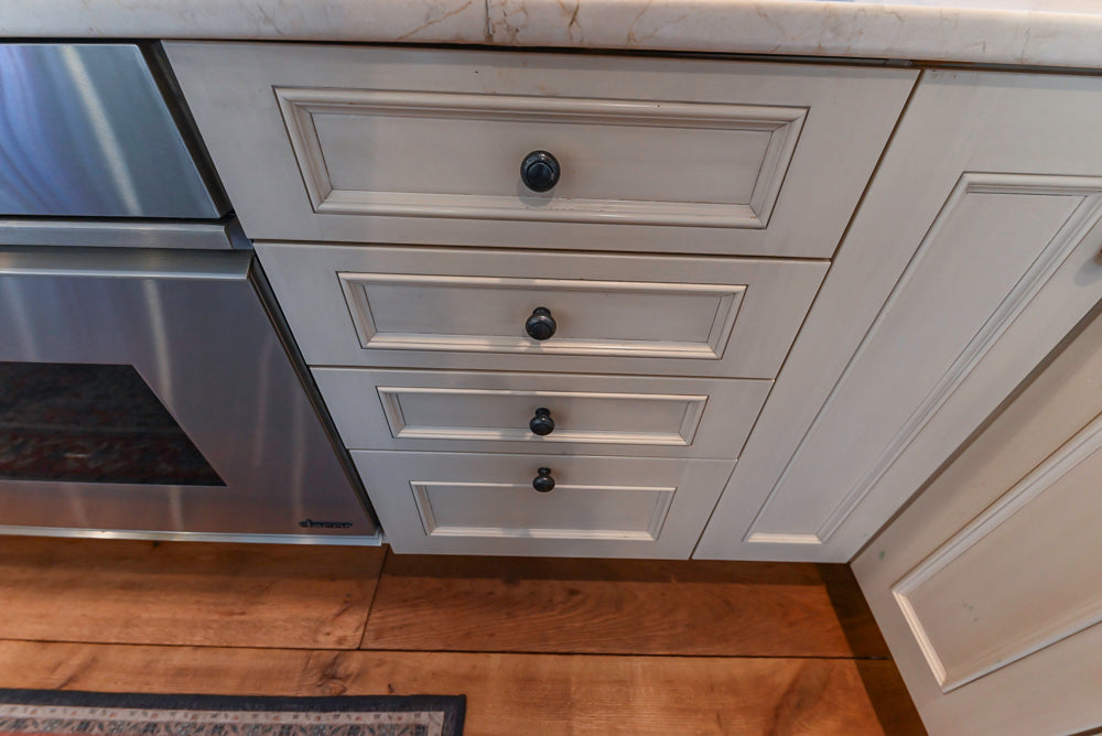 Wood-Mode Traditional Light Cream Kitchen with Marble Countertops and Wolf Range