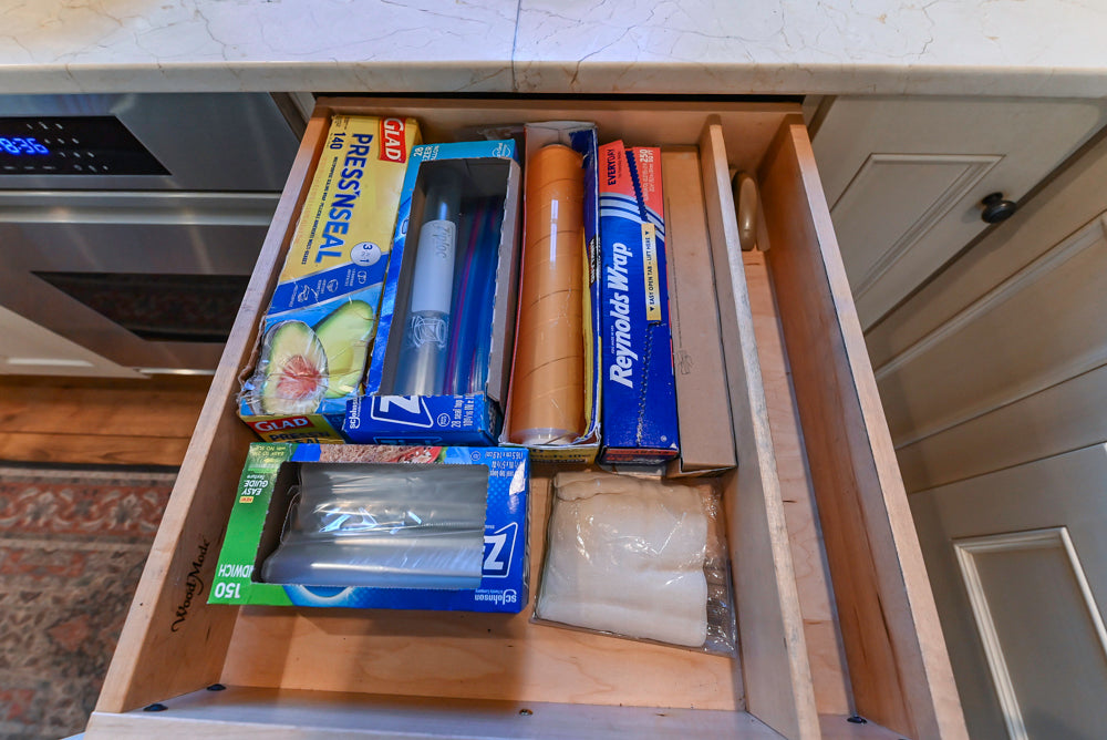 Wood-Mode Traditional Light Cream Kitchen with Marble Countertops and Wolf Range