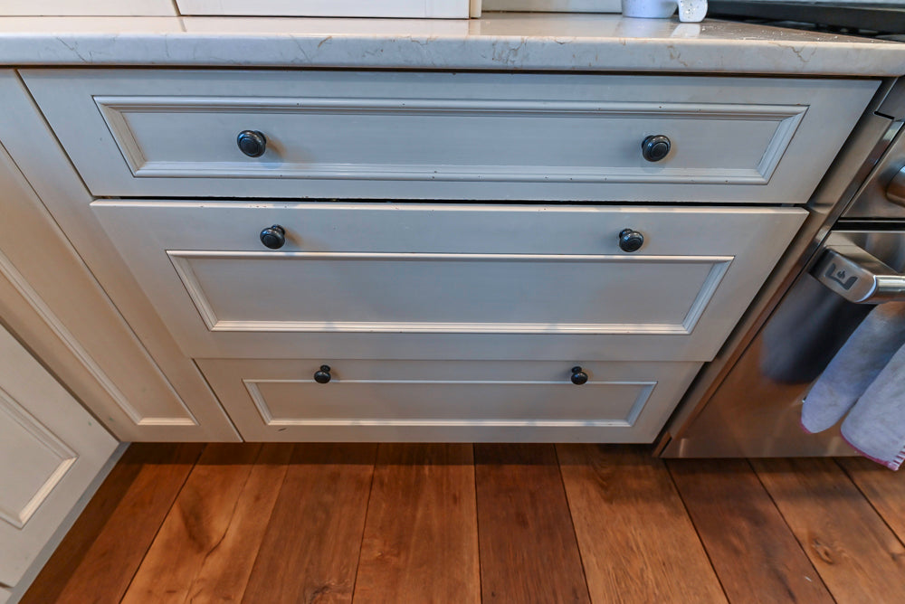 Wood-Mode Traditional Light Cream Kitchen with Marble Countertops and Wolf Range