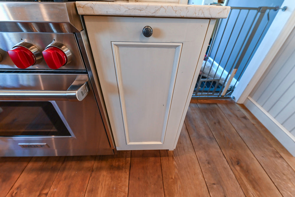 Wood-Mode Traditional Light Cream Kitchen with Marble Countertops and Wolf Range