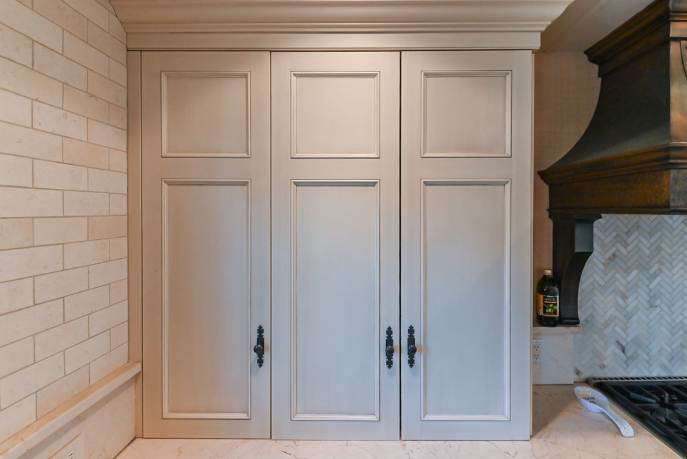 Wood-Mode Traditional Light Cream Kitchen with Marble Countertops and Wolf Range