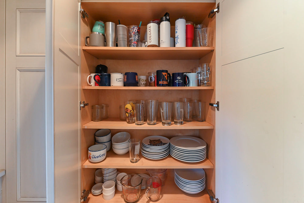 Wood-Mode Traditional Light Cream Kitchen with Marble Countertops and Wolf Range