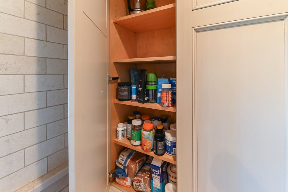 Wood-Mode Traditional Light Cream Kitchen with Marble Countertops and Wolf Range