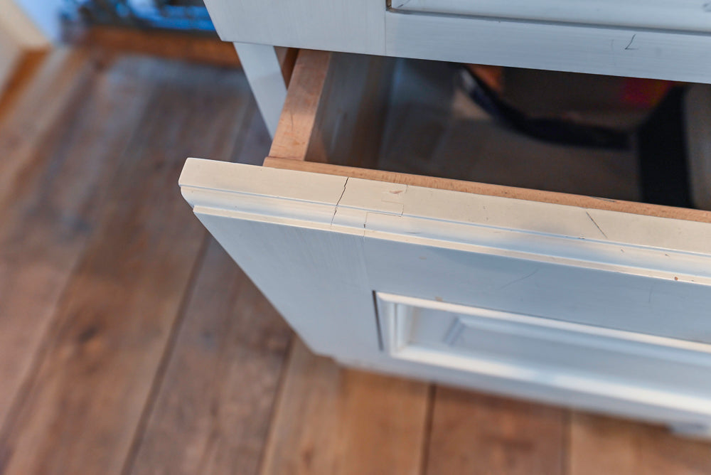 Wood-Mode Traditional Light Cream Kitchen with Marble Countertops and Wolf Range