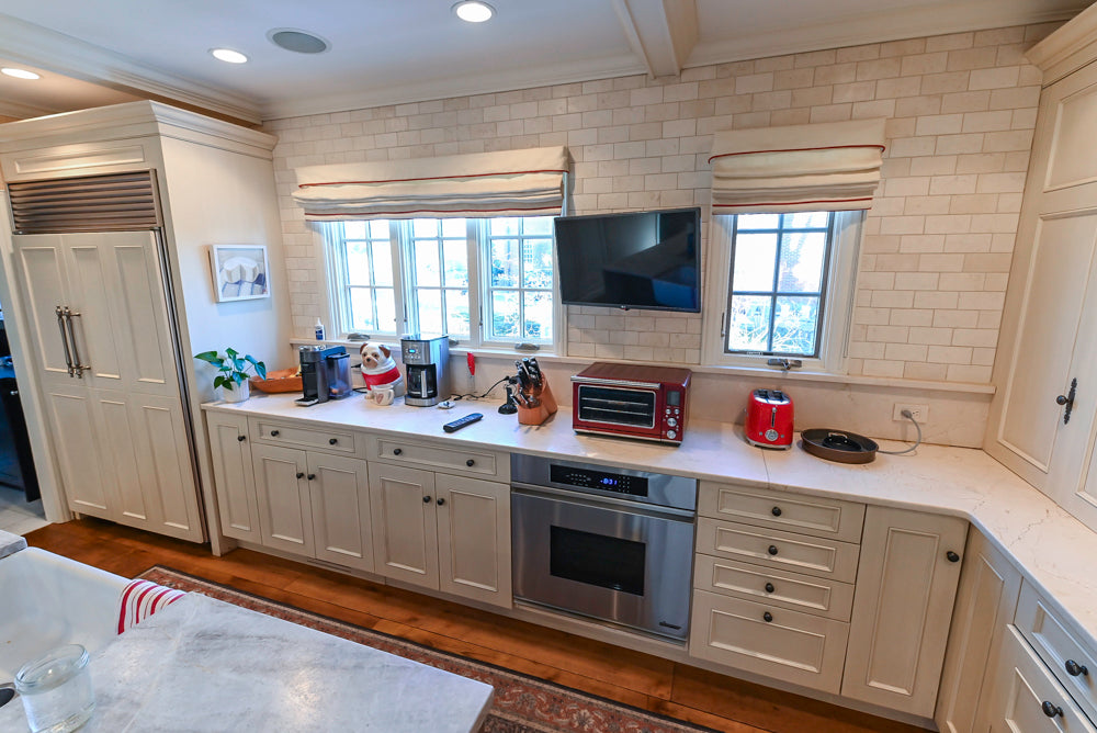 Wood-Mode Traditional Light Cream Kitchen with Marble Countertops and Wolf Range