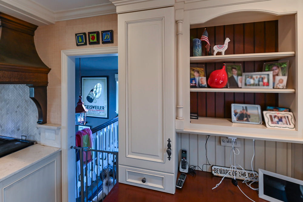 Wood-Mode Traditional Light Cream Kitchen with Marble Countertops and Wolf Range