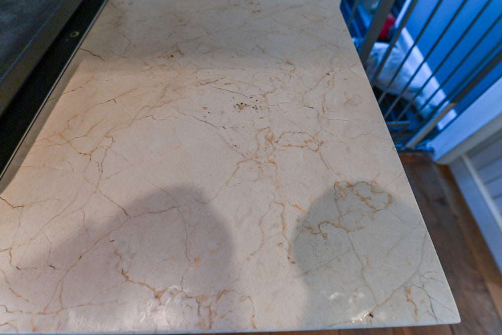 Wood-Mode Traditional Light Cream Kitchen with Marble Countertops and Wolf Range