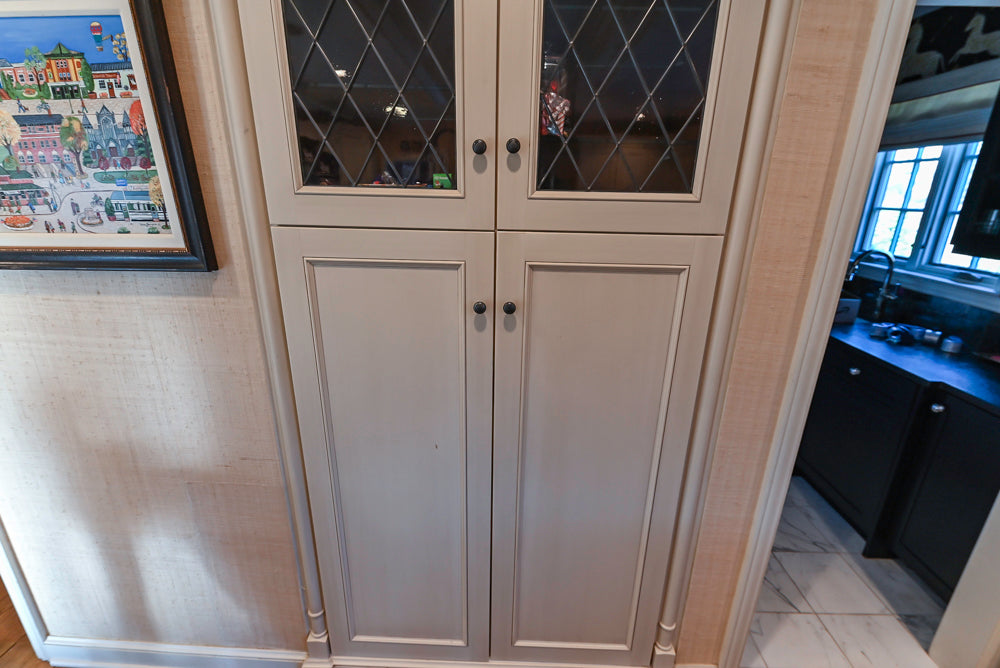 Wood-Mode Traditional Light Cream Kitchen with Marble Countertops and Wolf Range