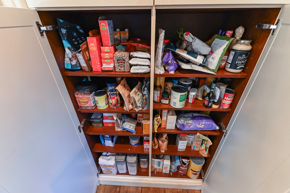 Wood-Mode Traditional Light Cream Kitchen with Marble Countertops and Wolf Range