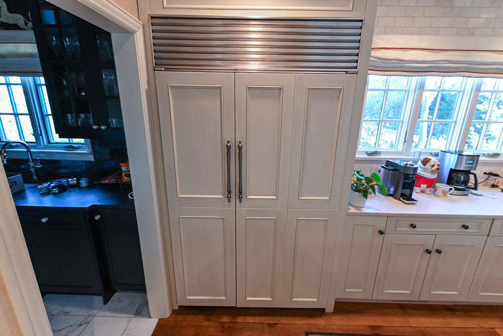 Wood-Mode Traditional Light Cream Kitchen with Marble Countertops and Wolf Range