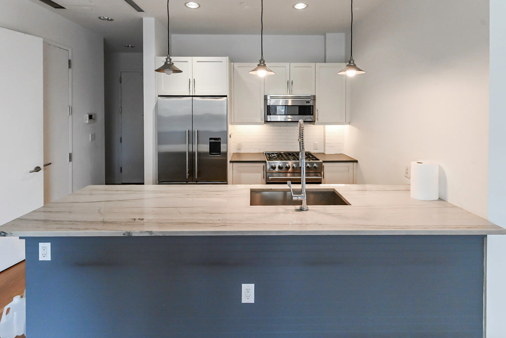 Imperia White Transitional Kitchen with Dark Grey Island, Marble & Stone Counters and Appliances