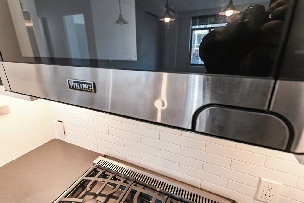 Imperia White Transitional Kitchen with Dark Grey Island, Marble & Stone Counters and Appliances
