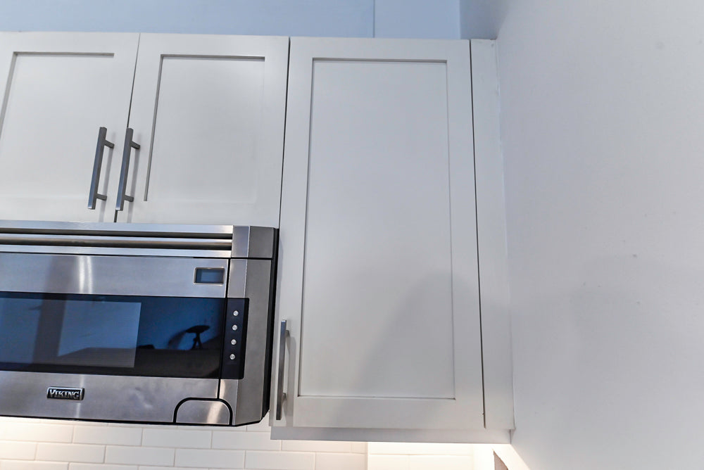 Imperia White Transitional Kitchen with Dark Grey Island, Marble & Stone Counters and Appliances