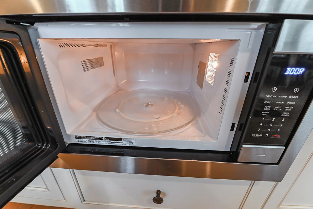 Omega Traditional Light Cream Kitchen with Island, Desk Area and Sub-Zero & Wolf Range