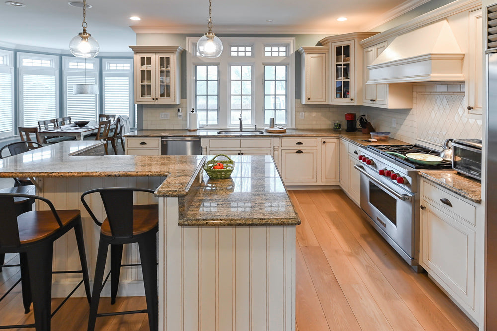 Omega Traditional Light Cream Kitchen with Island, Desk Area and Sub-Zero & Wolf Range