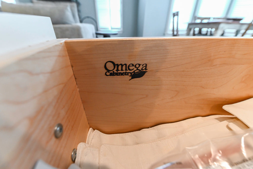 Omega Traditional Light Cream Kitchen with Island, Desk Area and Sub-Zero & Wolf Range