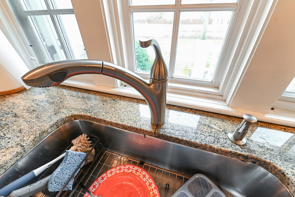 Omega Traditional Light Cream Kitchen with Island, Desk Area and Sub-Zero & Wolf Range