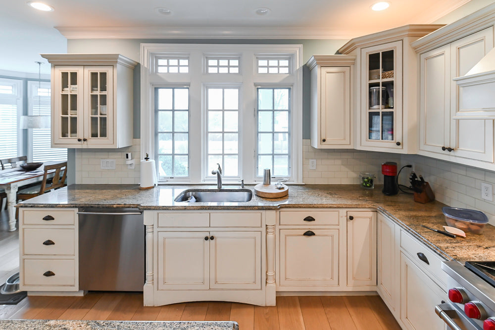 Omega Traditional Light Cream Kitchen with Island, Desk Area and Sub-Zero & Wolf Range