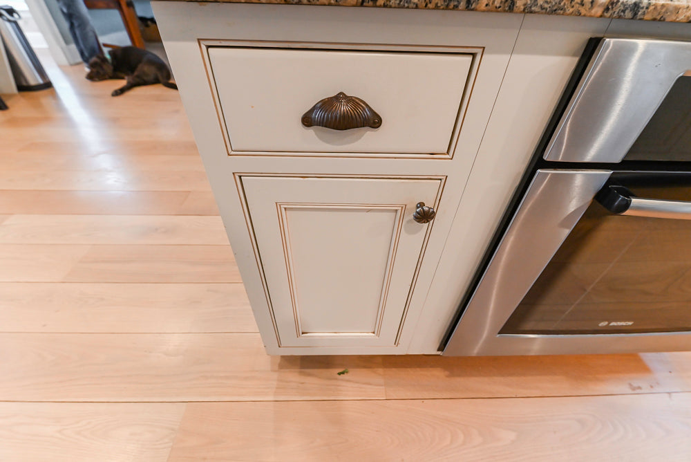 Omega Traditional Light Cream Kitchen with Island, Desk Area and Sub-Zero & Wolf Range