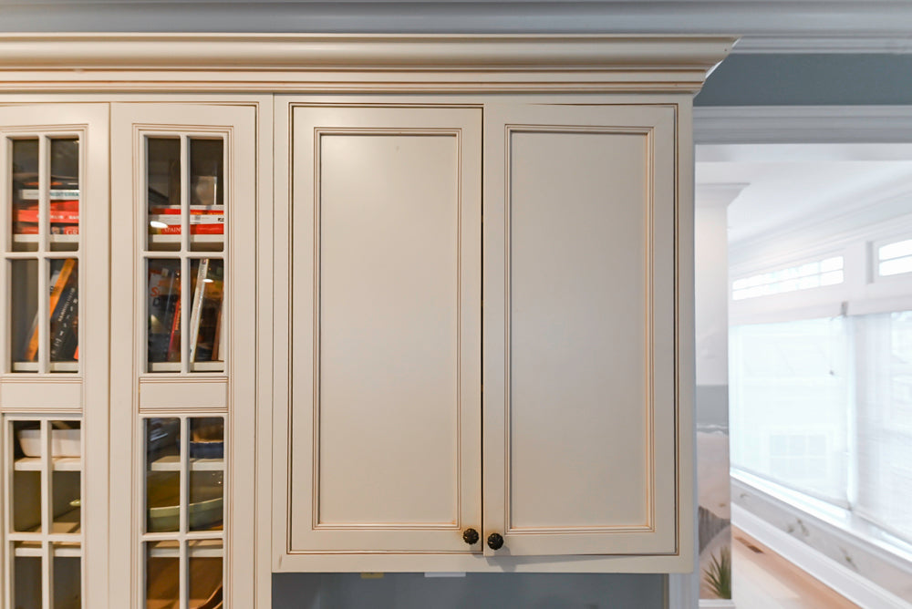 Omega Traditional Light Cream Kitchen with Island, Desk Area and Sub-Zero & Wolf Range