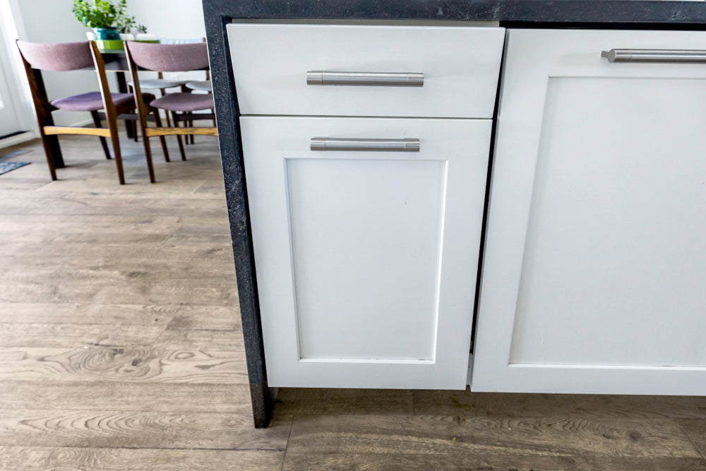 Transitional White Kitchen with Marble Waterfall Island and Thermador Appliances