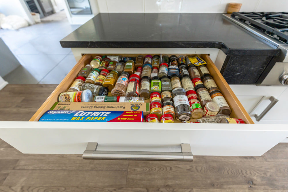 Transitional White Kitchen with Marble Waterfall Island and Thermador Appliances
