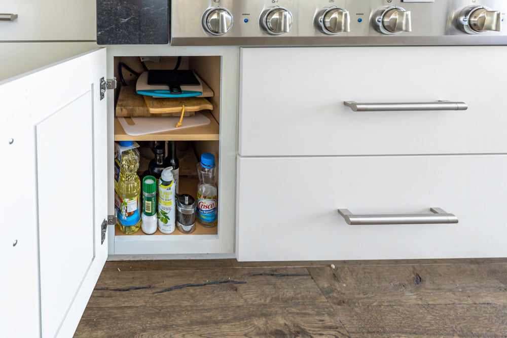 Transitional White Kitchen with Marble Waterfall Island and Thermador Appliances