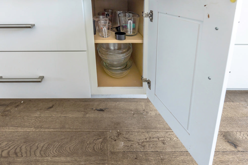 Transitional White Kitchen with Marble Waterfall Island and Thermador Appliances