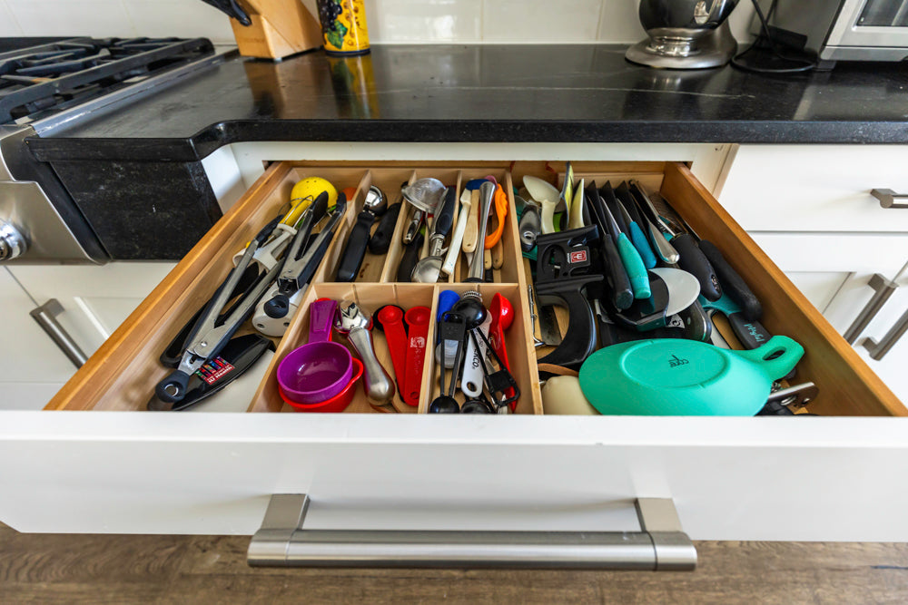 Transitional White Kitchen with Marble Waterfall Island and Thermador Appliances