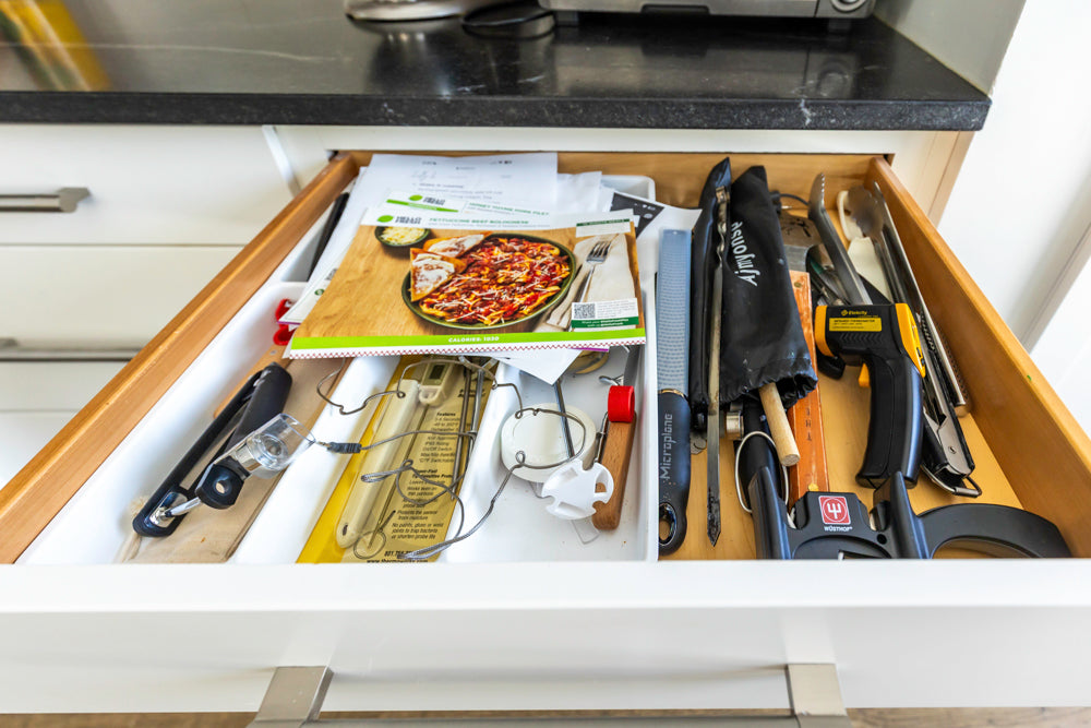 Transitional White Kitchen with Marble Waterfall Island and Thermador Appliances