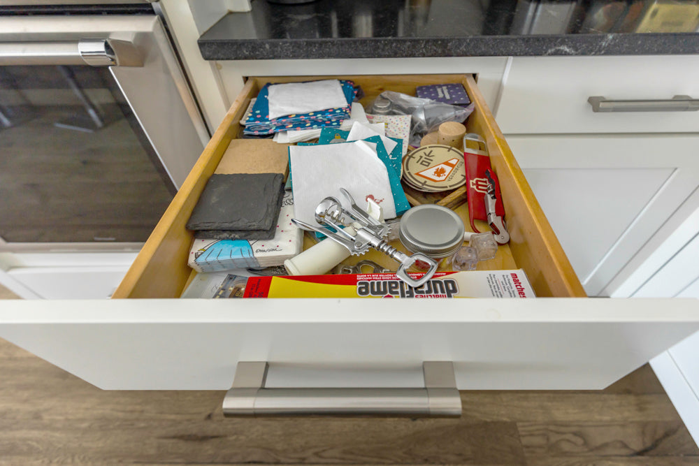 Transitional White Kitchen with Marble Waterfall Island and Thermador Appliances