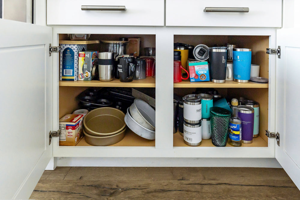 Transitional White Kitchen with Marble Waterfall Island and Thermador Appliances