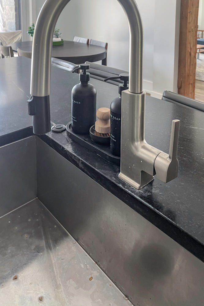 Transitional White Kitchen with Marble Waterfall Island and Thermador Appliances