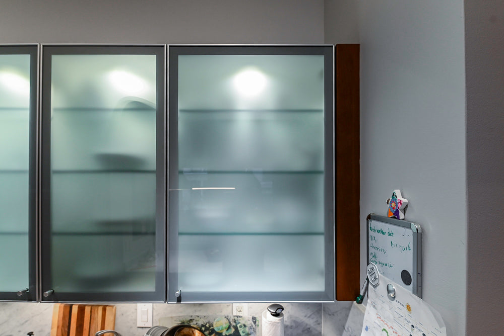 Poggenpohl Brown Toned Transitional Kitchen with Marble Countertops and Appliances