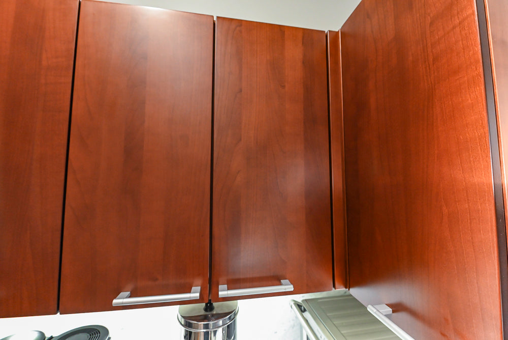 Poggenpohl Brown Toned Transitional Kitchen with Marble Countertops and Appliances