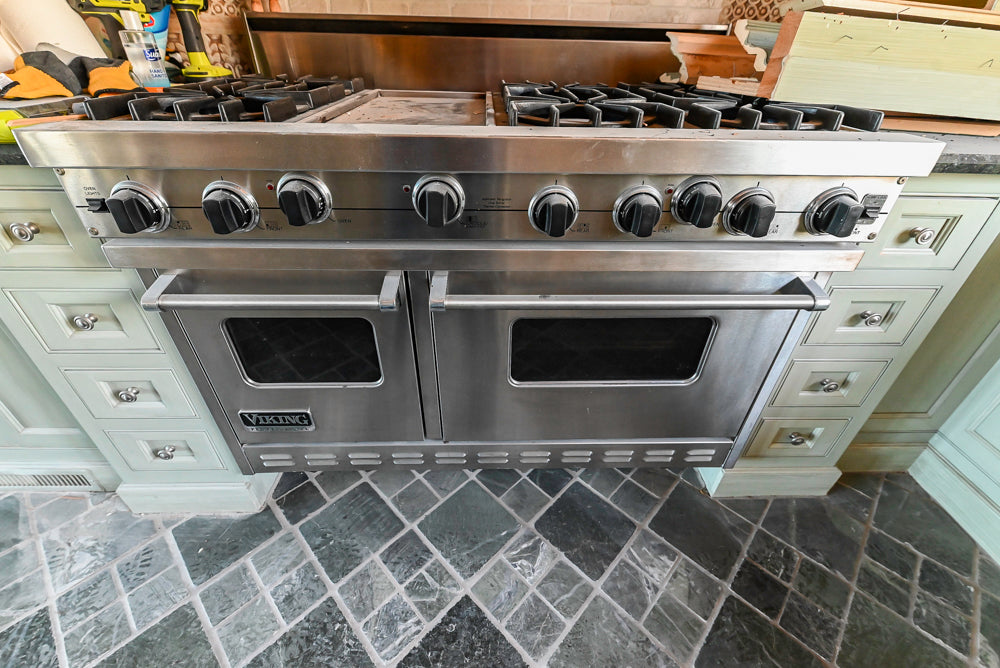 Traditional Washed Out Light Green Kitchen with Island, Granite Countertops and Viking Appliances