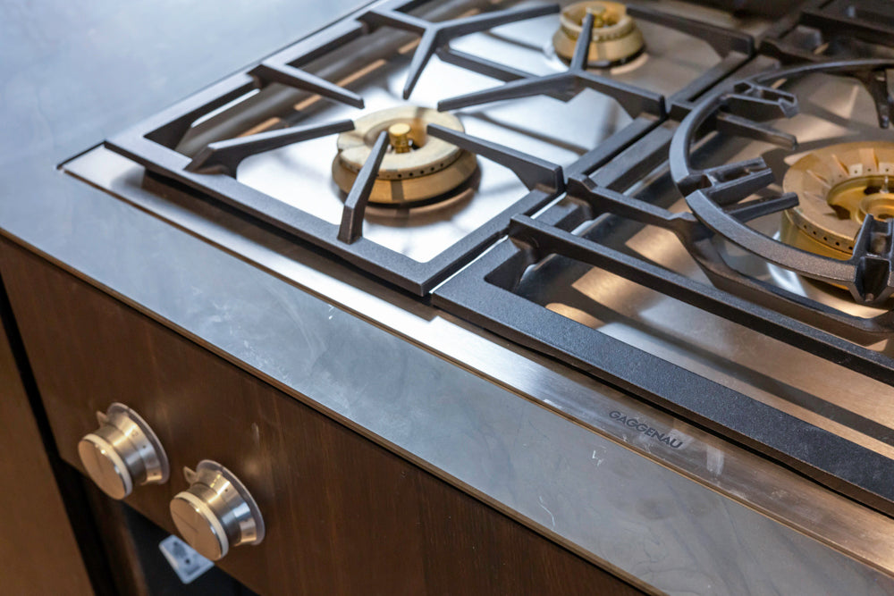 minotticucine Modern Classic Dark Brown Kitchen with Stone Countertops and Gaggenau Refrigerators
