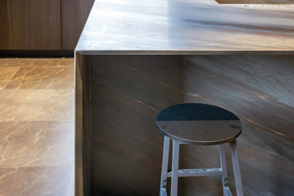 minotticucine Modern Classic Dark Brown Kitchen with Stone Countertops and Gaggenau Refrigerators