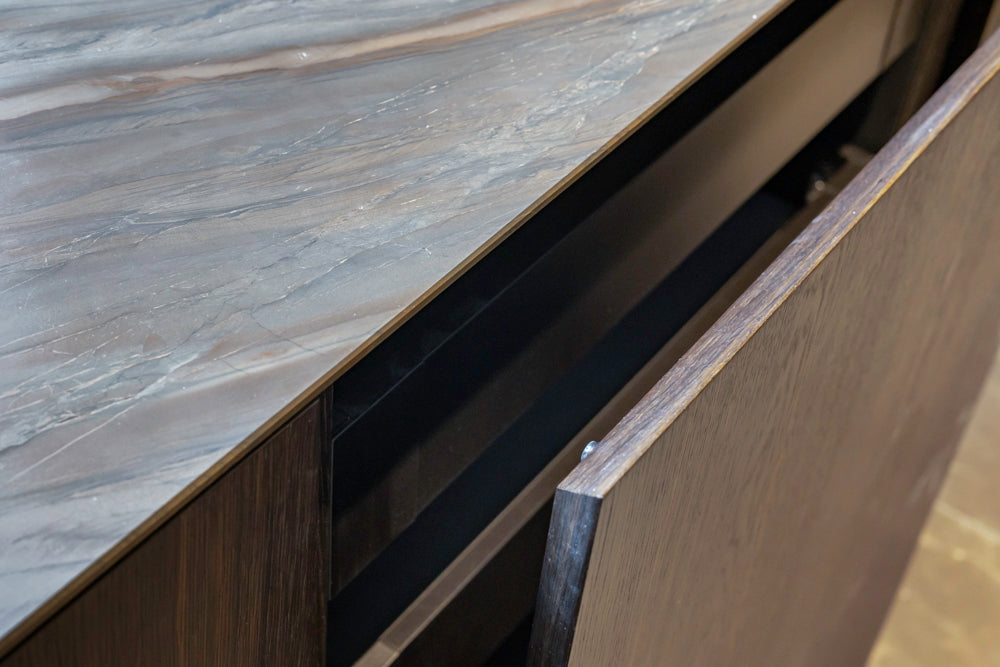 minotticucine Modern Classic Dark Brown Kitchen with Stone Countertops and Gaggenau Refrigerators