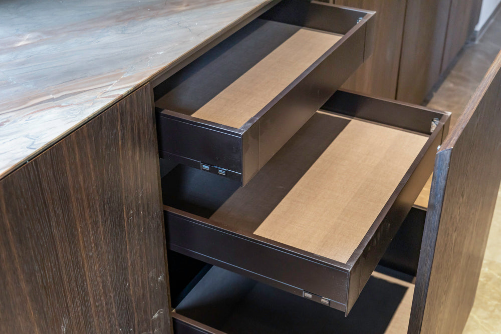 minotticucine Modern Classic Dark Brown Kitchen with Stone Countertops and Gaggenau Refrigerators