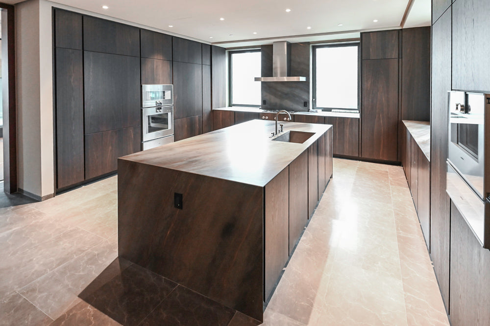 minotticucine Modern Classic Dark Brown Kitchen with Stone Countertops and Gaggenau Refrigerators