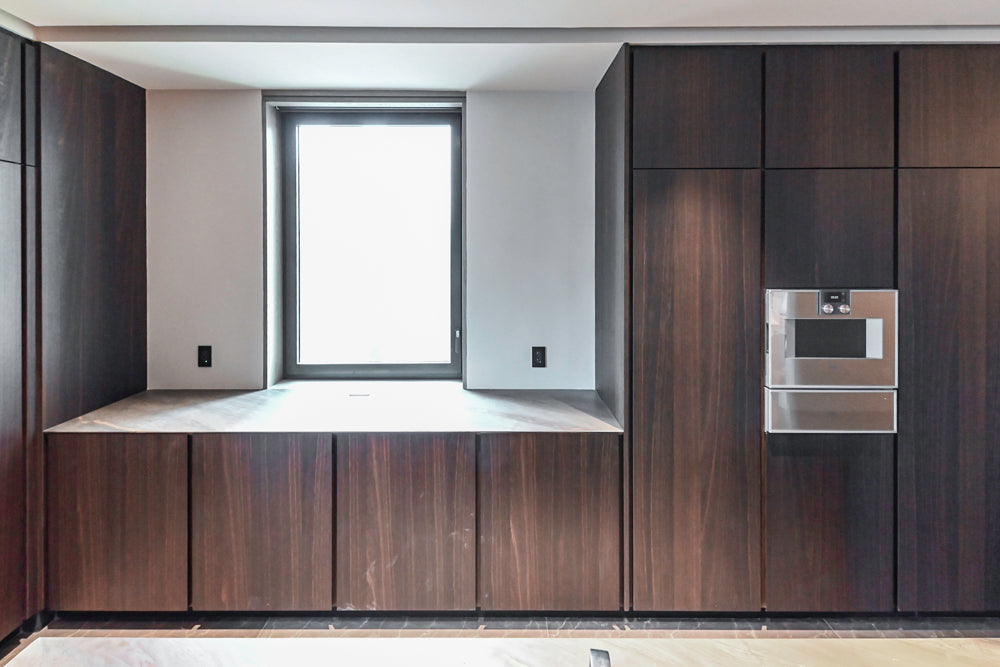 minotticucine Modern Classic Dark Brown Kitchen with Stone Countertops and Gaggenau Refrigerators