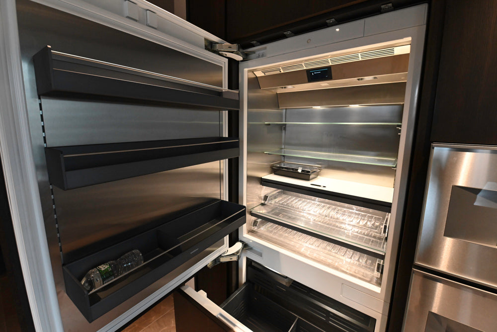 minotticucine Modern Classic Dark Brown Kitchen with Stone Countertops and Gaggenau Refrigerators