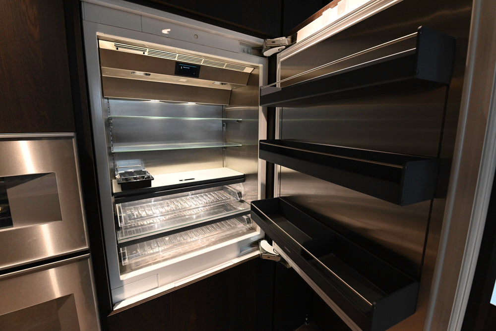 minotticucine Modern Classic Dark Brown Kitchen with Stone Countertops and Gaggenau Refrigerators