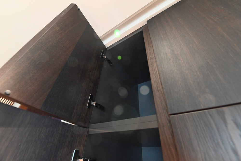 minotticucine Modern Classic Dark Brown Kitchen with Stone Countertops and Gaggenau Refrigerators