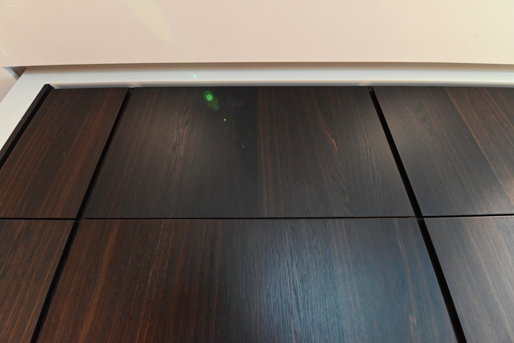 minotticucine Modern Classic Dark Brown Kitchen with Stone Countertops and Gaggenau Refrigerators