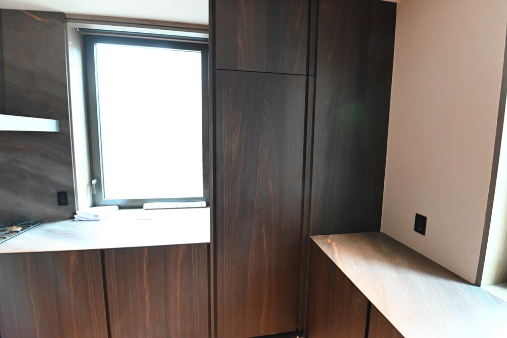 minotticucine Modern Classic Dark Brown Kitchen with Stone Countertops and Gaggenau Refrigerators