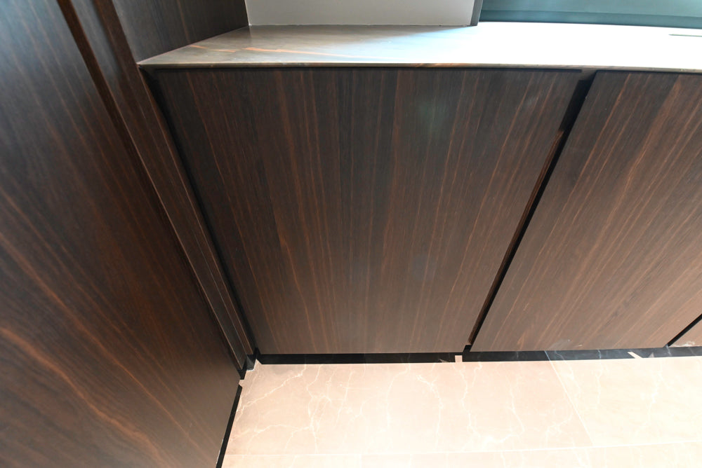 minotticucine Modern Classic Dark Brown Kitchen with Stone Countertops and Gaggenau Refrigerators