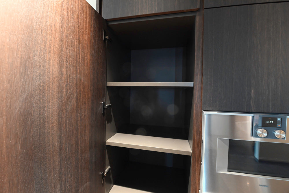 minotticucine Modern Classic Dark Brown Kitchen with Stone Countertops and Gaggenau Refrigerators